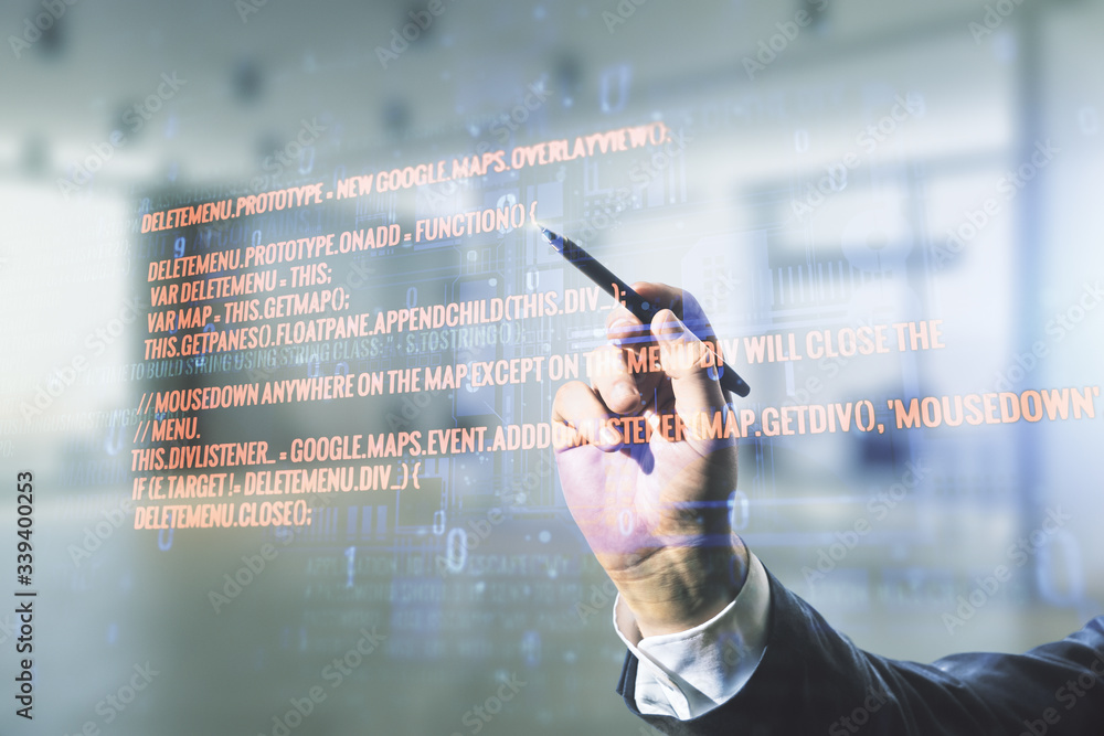 Poster double exposure of male hand with pen working with abstract programming language interface on blurre