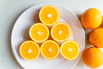 Freshly juicy oranges on serve 
