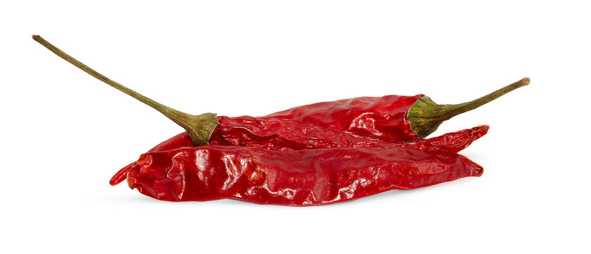 Dried red hot peppers isolated on white.