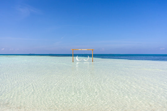 The beautifull beach of Dhangethi, maldives. Known for Diving, day tour for resort and this beautifull beaches and the swing in the water