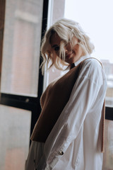 Beautiful and cute girl portrait in loft interior 