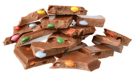 Cube milk chocolate with colorful dragee Isolated
