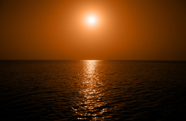 Sunset on the river in the Volga delta. Astrakhan Region. Russia.