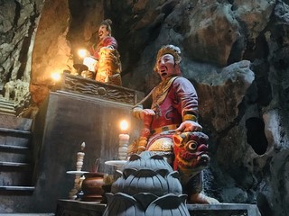Buddha image and statue inside Huyen Khong cave at Marble mountains in Danang, Vietnam