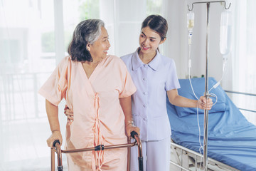 the nurses are well good taken care of elderly patients in hospital bed patients feel happiness - medical and healthcare concept