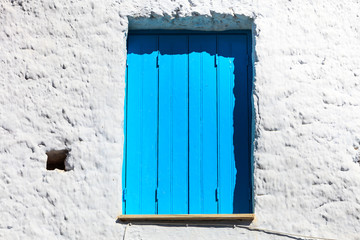 Greek blue window shutters