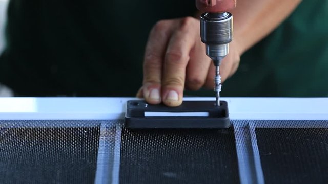 Mechanic is drilling aluminum by using a small drill to drill aluminum.