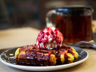 Brussels waffles with ice cream and jam.