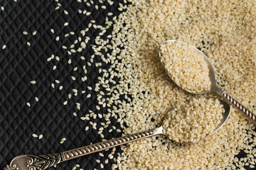 Close up view of dry sesame seeds. Natural oil-rich food