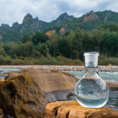Glass flask with clean drinking water.