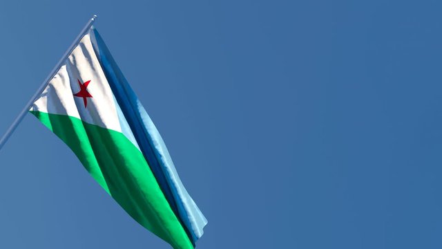 The national flag of Djibouti is flying in the wind