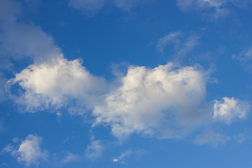 .Clouds in the firmament, evening sunset, clear Sunny day.