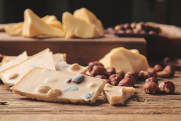 Sweet chocolate with nuts on table