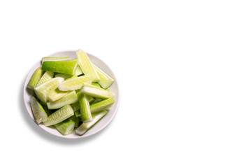 Cucumber in white bowl isolated on white background