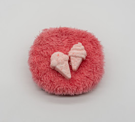 Cute Mini ice-cream bath bomb on red fluffy carpet