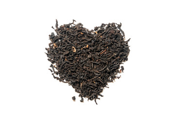 Heap of everyday brew loose dried organic black tea heart shape made with whole leaves isolated on white. Top view