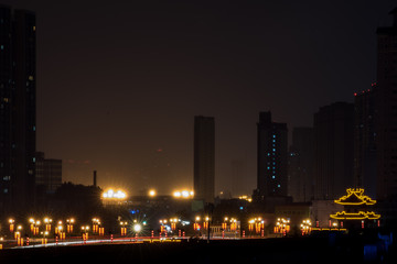 Fototapeta na wymiar Fortifications of Xi'an at night