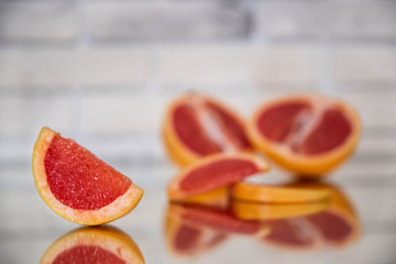grapefruit slices on a light background close-up