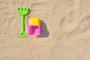 Colorful Beach Toys at a Beach on a Sunny Day