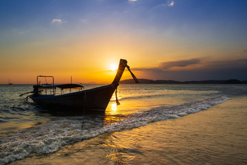 Beautiful Sunset Scene over Longtail Boat in Thailand, Krabi province Background.