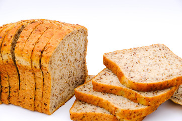 Fresh homemade baked bread and sliced bread isoalted on white background
