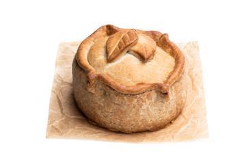 Seasoned cured pork and ham pie isolated on white