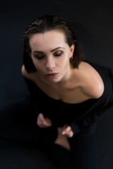 Top view portrait of young woman with closed eyes.