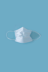 face mask during on blue background