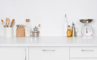 Modern simple kitchen counter interior with kitchenware on white background