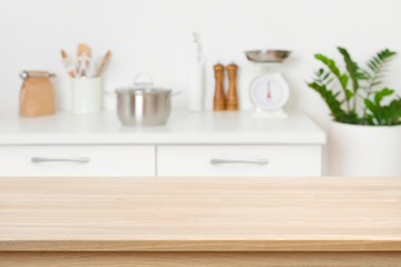 Fototapeta na wymiar Table background of free space on blurred kitchen counter interior