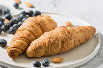Croissants on a white Terence on a light table