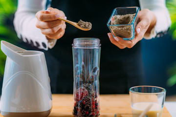 Making Healthy Shake with Berries and Plant Protein Powder