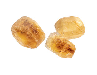 caramel brown sugar isolated on white with clipping path.