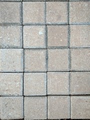 close up street cement block background textured. good for background or wallpaper.