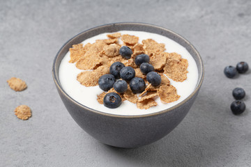 Healthy tasty breakfast. Multigrain wholewheat healthy cereals with fresh berry blueberry and...