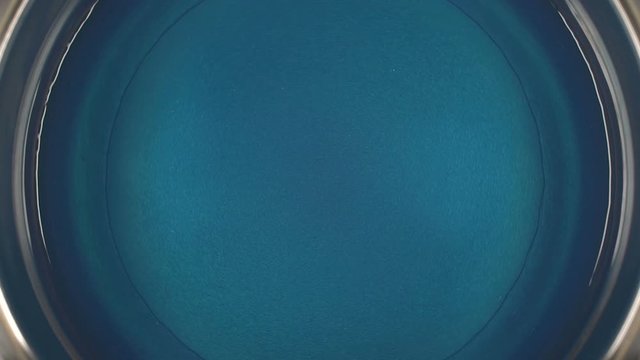 Rheoscopic fluid. Beautiful movement of particles in a liquid. Fantastic patterns and shapes. 50 fps
