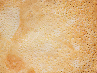 Fototapeta na wymiar homemade russian pancake close-up, texture background