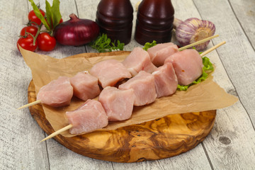 Raw pork meat skewer for grill