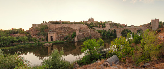 Fototapeta premium Panoramic view at the Old Town of Toledo in Spain. St. Martin's old Bridge.