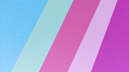 Obraz premium Multicolored pastel texture background. Purple, pink, green, blue sheets on photo.