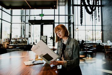 Woman reading a menu