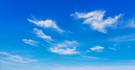 Naklejka na ściany i meble background of blue sky with clouds