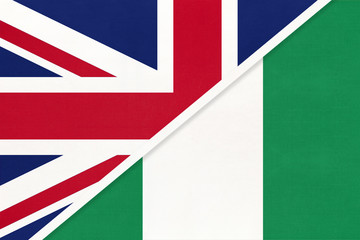 United Kingdom vs Nigeria national flag from textile. Relationship between two European and African countries.
