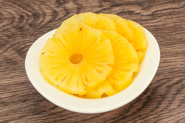 Marinated pineapple rings in the bowl