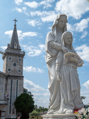 Nakorn Phanom, Thailand - Nov 18th, 2019: Saint Anna Church is located on Sonthornvijit Road which runs parallel to the dame in front of the city of Nakhon Phanom