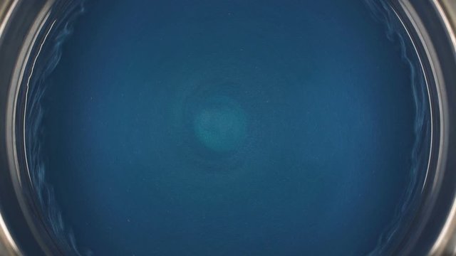 Rheoscopic fluid. Beautiful movement of particles in a liquid. Fantastic patterns and shapes. 50 fps