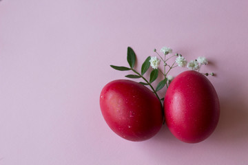 colored Pink easter eggs on pink background. easter greeting card. happy easter