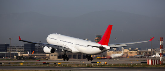 Landing passenger plane at the airport of Barcelona. Spain
