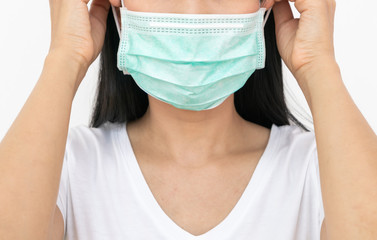 A woman wears a face mask that protects against the spread of Coronavirus (COVID-19).