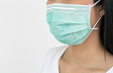 A woman wears a face mask that protects against the spread of Coronavirus (COVID-19).